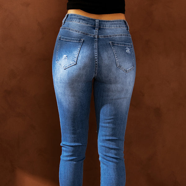 Jeans skinny effetto consumato a vita alta azzurri