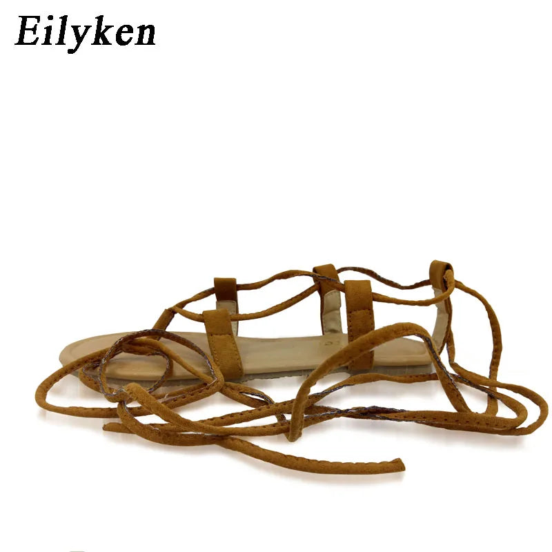 Eilyken Sandali romani estivi con cinturino incrociato alto al ginocchio Bondage infradito sandali piatti da donna infradito nero albicocca